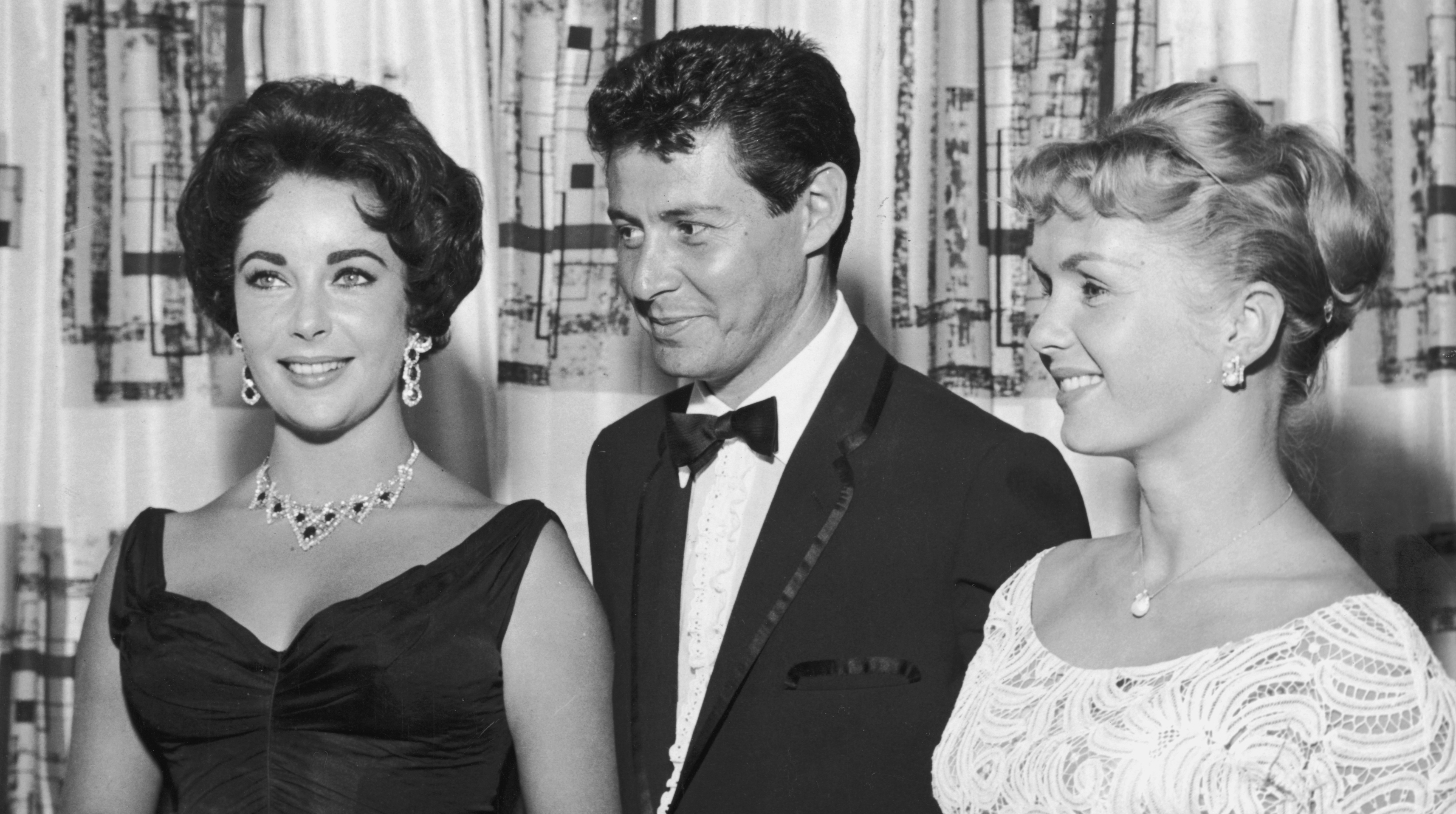 Eddie Fisher with Elizabeth Taylor and Debbie Reynolds (Getty Images)